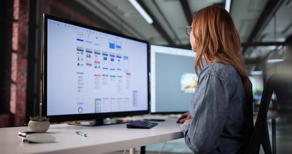 Product management graduate working at desk